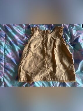 Woman’s Sleeveless Fringe Hem shirt